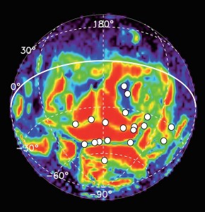 Carte de distribution des aurores discrètes (cercles blancs) recensées par le Pr Gérard dans l'hémisphère sud de Mars. Le paléomagnétisme apparait en fond de carte. © ULg, ESA (Cliquer pour agrandir)